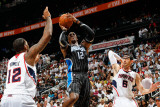 Orlando Magic v Atlanta Hawks - Game Four  Atlanta  GA - April 24: Dwight Howard  Kirk Hinrich and 