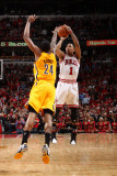 Indiana Pacers v Chicago Bulls - Game Five  Chicago  IL- April 26: Derrick Rose and Paul George