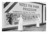 Suffragettes Uses Long Brushes To Post a Billboard Announcing a "Votes" For Women" Parade