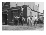 Firefighter Jumps Into Net Held By Fellow Firemen