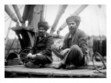 Two Sikh Men Sitting on a Dock  Circa 1913