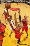 Chicago Bulls v Miami Heat - Game Three  Miami  FL - MAY 22: Chris Bosh  Taj Gibson