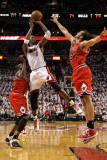 Chicago Bulls v Miami Heat - Game Four  Miami  FL - MAY 24: Chris Bosh  Joakim Noah  Luol Deng