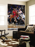 Los Angeles Clippers v Minnesota Timberwolves: Jarron Collins and Kevin Love