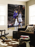 Golden State Warriors v Dallas Mavericks: Reggie Williams and Alexis Ajinca