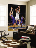 New York Knicks v Washington Wizards: Yi Jianlian and Timofey Mozgov