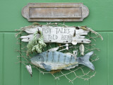 Fish Tales Told Here Sign on the Cottage Door  Clovelly  Devon  UK