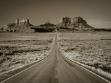 Straight Road Cutting Through Landscape of Monument Valley  Utah  USA