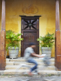 Man Cycling Past Doorway in Old Town of Galle Fort  Galle  Sri Lanka