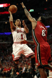 Miami Heat v Chicago Bulls - Game Five  Chicago  IL - MAY 26: Derrick Rose and LeBron James