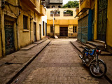 Back Street of Luxor Town  Egypt with Motorbike