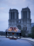 Notre Dame Cathedral and Taxi  Paris  France