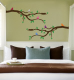 Branch With Multi-Colored Birds