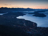 High Angle View of a Coastal Town Lit Up at Dusk  Lake Nahuel Huapi  San Carlos De Bariloche