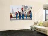 Women Practising Tai Chi with Fans on the Bund
