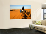 Traveller Riding Camel at Erg Chebbi
