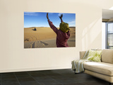 Tuareg Man Guiding 4Wd Car Through Soft Sand Dune