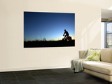 Man Cycle Touring at Dawn