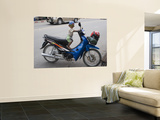 Young Motorcyclist with Goggles on Stationary Motorcycle