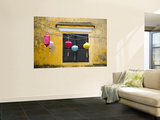 Lanterns Hanging Besides Bright Yellow Wall