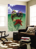 Two People Snorkelling with Starfish