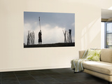Silhouette of Young Child Holding Prayer Flag