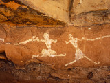 Libya  Fezzan  Jebel Akakus; a Pair of Running Figures Painted onto the Walls of Uan Muhuggiag
