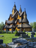 Tourists Checking Map Beside Heddal Stave Church  Norway's Largest Wooden Stavekirke