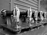 India  Mysore; Recently-Repaired Sewing Machines Outside a Sewing-Machine Repair Shop in Mysore