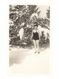 Woman in Bathing Suit in Snow