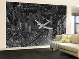 Aerial View of a DC-4 Passenger Plane Flying over Midtown Manhattan