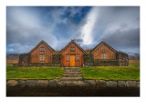 Three Houses with a Grass Roof