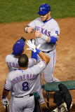 Rangers v Cardinals  St Louis  MO - Oct 27: Josh Hamilton  Esteban German and Yorvit Torrealba