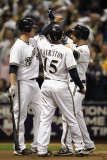 Cardinals v Brewers - Oct 16: Chris Narveson  Jerry Hairston Jr and Jonathan Lucroy
