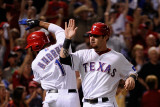 Detroit Tigers v Texas Rangers - Game Six  Arlington  TX - Oct 15: Josh Hamilton and Elvis Andrus