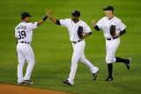 Rangers v Detroit Tigers - Detroit  MI - Oct 13: Ramon Santiago  Austin Jackson and Don Kelly