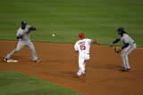 Brewers v St Louis Cardinals - Oct 12: Rickie Weeks  Yuniesky Betancourt and Rafael Furcal