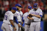Texas Rangers v St Louis Cardinals  St Louis  MO - Oct 27: Colby Lewis and Ron Washington