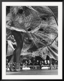 Legs and Swirling Skirts of Chorus Girls in Routine at Harem Club
