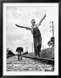 Larry Jim Holm with Dunk  His Spaniel Collie Mix  Walking Rail of Railroad Tracks in Rural Area