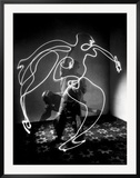 Multiple Exposure of Artist Pablo Picasso Using Flashlight to Make Light Drawing of a Figure
