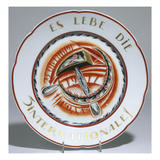 A Soviet Propaganda Plate  the Centre Painted with a Stylised Hammer and Sickle