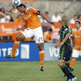 Houston July 30 - Brian Ching and Osvaldo Alonso