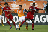Houston August 21 - Baggio Husidic  Brian Ching and Dasan Robinson