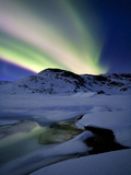 Aurora Borealis over Mikkelfjellet Mountain in Troms County  Norway