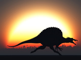 A Silhouetted Spinosaurus Sprinting Against a Setting Set at the End of a Jurassic Day