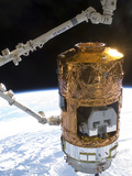 The Japanese H-II Transfer Vehicle in the Grasp of Canadarm2