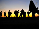 Green Berets Prepare to Board a KC-130 Aircraft