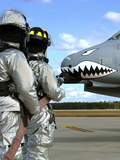 Firefighters Deploy a Fire Hose During a Drill at Moody Air Force Base