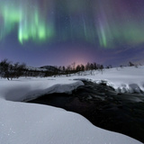 Aurora Borealis over Blafjellelva River in Troms County